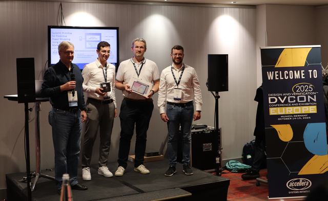 Christoph Hazott present the award for the 3rd place together with 3 other scientists on stage